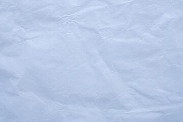 Obraz premium Abstract Wrinkled Pale Blue Paper Surface for Design Backdrop
