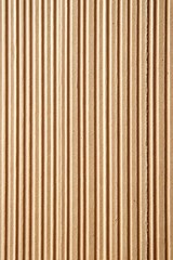 Obraz premium Brown corrugated cardboard texture with vertical ridges