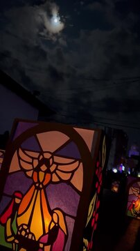 Lantern with the moon in the background on the Night of the Little Candles, a traditional Colombian December celebration