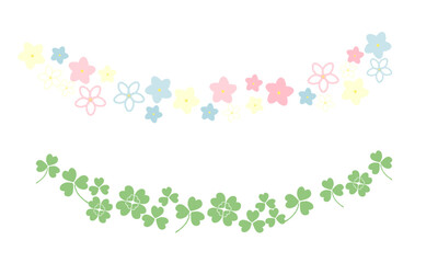 手描きの四つ葉のクローバーと花のカーブしたライン