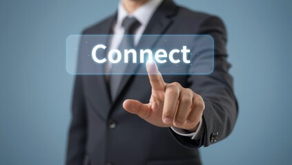 Businessman touching a digital screen with the word Connect displayed connection