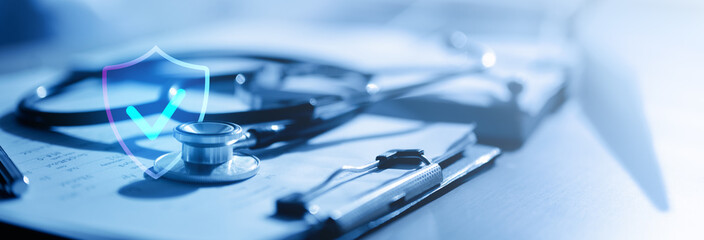 Fototapeta na wymiar Health insurance and medical coverage concept with stethoscope, clipboard, and protection shield icon. Represents healthcare benefits, patient care, medical assurance, wellness planning.