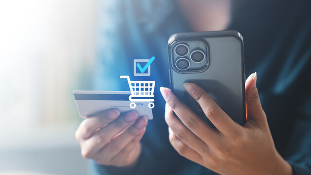 Online shopping order confirmation concept showing a customer using a smartphone and credit card with a successful checkout icon, representing secure e-commerce payment, transaction approval.