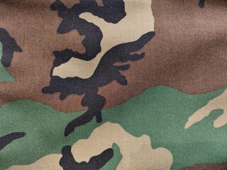 camouflage fabric background © Dendae