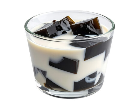 Refreshing Glass of Grass Jelly Cubes in Creamy Milk, Close-Up View.