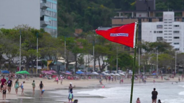 Red flag warns of dangerous conditions at Atalaia beach, Itajai, Brazil