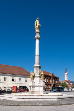 Zagreb, Croatia &ndash; Monument of the Assumption of the Blessed Virgin Mary, featuring the golden statue atop a tall column in the historic Kaptol area.