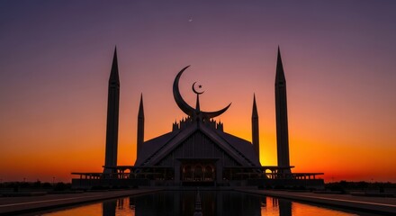 Fototapeta premium Mosque Silhouette at Sunset with Crescent Moon.