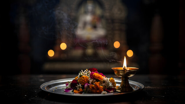 Temple offering plate with warm bokeh