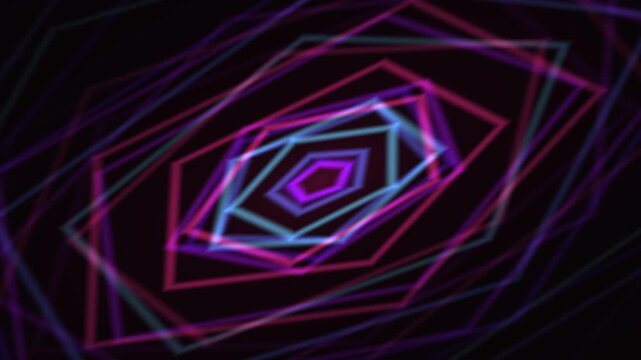 Abstract, blurred, colorful pentagonal shapes radiating outwards on a dark background