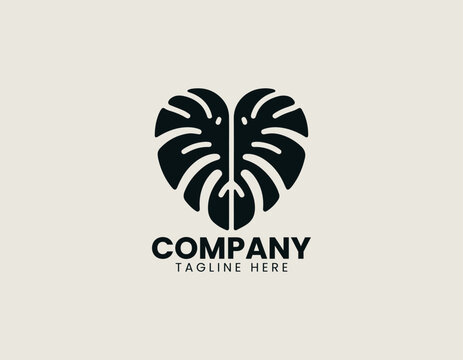 Black vector logo pair of monstera leaves arranged symmetrically forming a heart like shape