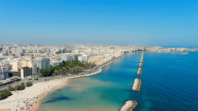 Bari, Italy. The central embankment of the city during the day. Lungomare di Bari. Summer. Bari - a port city on the Adriatic coast. Drone footage