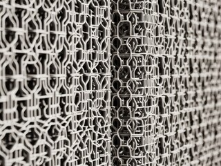 Stacked Metal Wire Fences Closeup in Industrial Setting