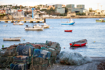 Fishing traps and harbor boats with waterfront skyline