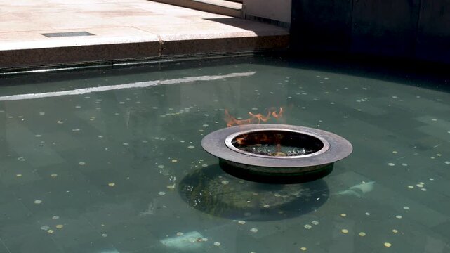 Eternal Flame Burning in the Pool of Reflection at Australian War Memorial