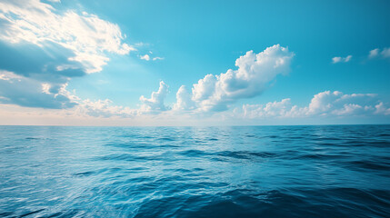 Fototapeta premium Blue sky over calm sea. Blue sea and sunny sky on horizon over calm water