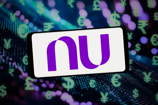 Stuttgart, Germany - 02-11-2026: In this photo illustration, the logo of Brazilian company Nu Holdings Ltd. (Nubank) is displayed on a smartphone in front of abstract background on computer screen.
