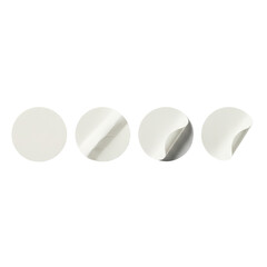 Four round white paper stickers with peeling corners and adhesive backing, isolated on a transparent background, perfect for branding mockups or product labeling.
