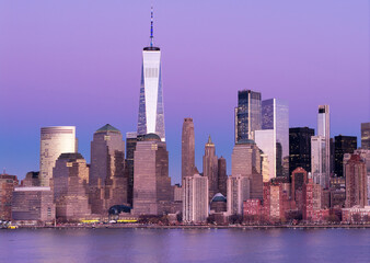 Obraz premium Manhattan skyline at dusk. New York City skyscrapers panorama. Manhattan panoramic skyline. New York City skyline background. Manhattan skyscrapers over New York. New York skyline panorama.