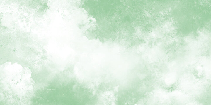 abstract mint green watercolor background with ethereal white cloud texture for wellness, spring themes, and creative overlays.