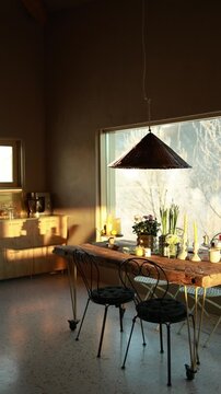Static shot of a cozy modern mountain house interior in winter. Warm sunlight fills the space while a hanging lamp gently sways, creating a calm, peaceful slow living atmosphere.