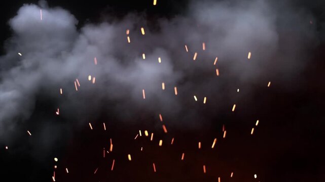 Fiery sparks and smoky haze floating against a dark background