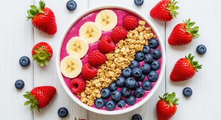 Vibrant Smoothie Bowl: A visually stunning smoothie bowl bursts with color and flavor, featuring a creamy pink base artfully arranged with fresh fruit, and crunchy granola.
