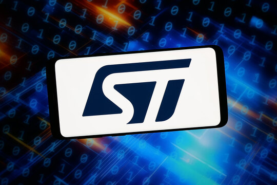 Stuttgart, Germany - 02-11-2026: In this photo illustration, the logo of company STMicroelectronics NV (ST, STMicro) is displayed on a smartphone in front of abstract background on computer screen.