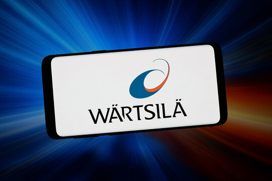 Stuttgart, Germany - 02-11-2026: In this photo illustration, the logo of Finnish company Wartsila Oyj Abp is displayed on a smartphone in front of abstract background on computer screen.