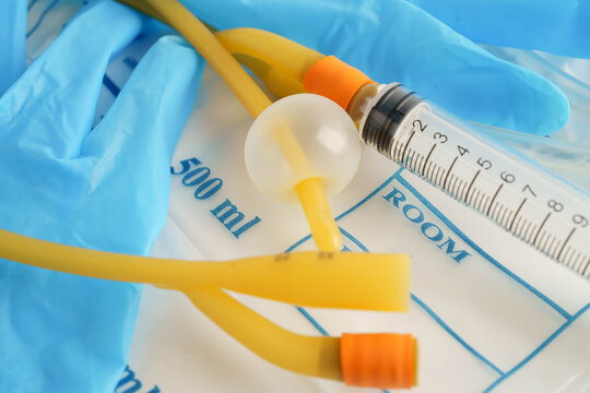 Foley catheter and urine drainage bag collect urine for disability or patient in hospital.