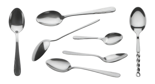 Assorted stainless steel spoons of various sizes and handle styles on a transparent background