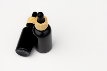Black Serum Bottle Isolated on Clean White Background for Beauty Display