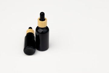Black Serum Bottle Isolated on Clean White Background for Beauty Display