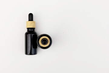 Black Serum Bottle Isolated on Clean White Background for Beauty Display
