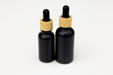 Black Serum Bottle Isolated on Clean White Background for Beauty Display