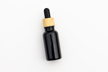 Black Serum Bottle Isolated on Clean White Background for Beauty Display
