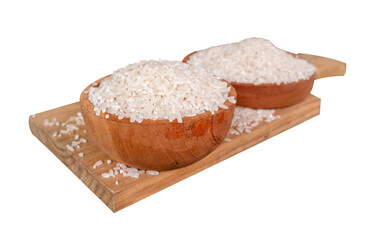 rice in a wooden bowl on wooden tray isolated on a white background