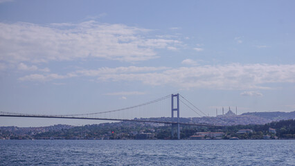 Obraz premium Iconic Bosphorus Bridge Spanning the Bosphorus Strait in Istanbul, Turkey, Connecting the European and Asian Continents with a Panoramic Cityscape View