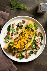 Omelet with mushrooms and spinach