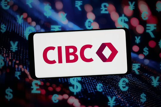 Stuttgart, Germany - 02-12-2026: In this photo illustration, the logo of Canadian Imperial Bank of Commerce (CIBC) is displayed on a smartphone in front of abstract background on computer screen.