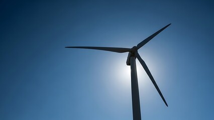 Wind Turbine Against Blue Sky.