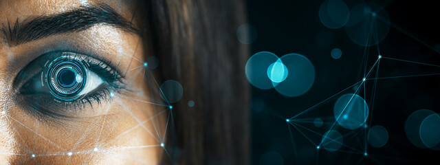 Close-up of a human eye with digital interface elements symbolizing futuristic computer vision...