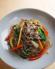 japchae, beef and rice noodles