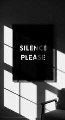 Fototapeta premium Minimalist Black And White Composition Showcasing a 'Silence Please' Sign and Shadow Play