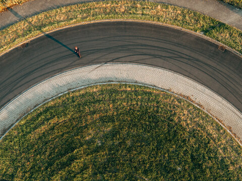 Businessman standing in roundabout
