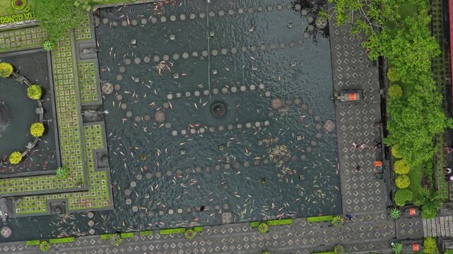 Aerial top down view of tirta gangga water palace in bali