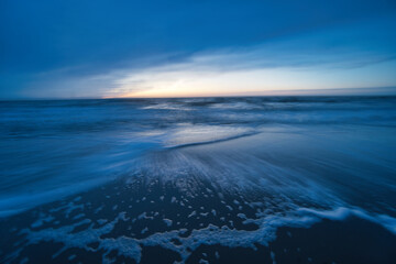 moody sunset over  sea