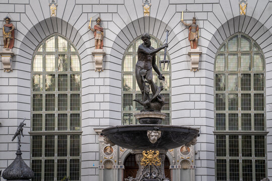 Bronze statue of Neptune's Fountain in front of Artus Court, Gdansk, Poland