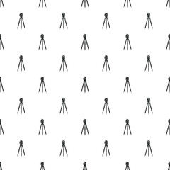 Obraz premium Repeating pattern showing surveying instruments with tripods on a white background