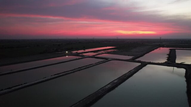 sunst view of fish pond in desert